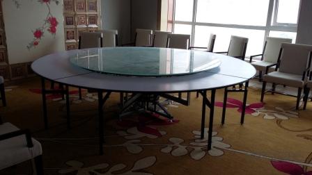 西安酒店饭店宴会折叠餐桌上的自动旋转转盘